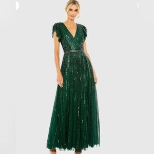Dark Green Sequined Wrap Over Ruffled Cap Sleeve GownRegular price$698 USD.